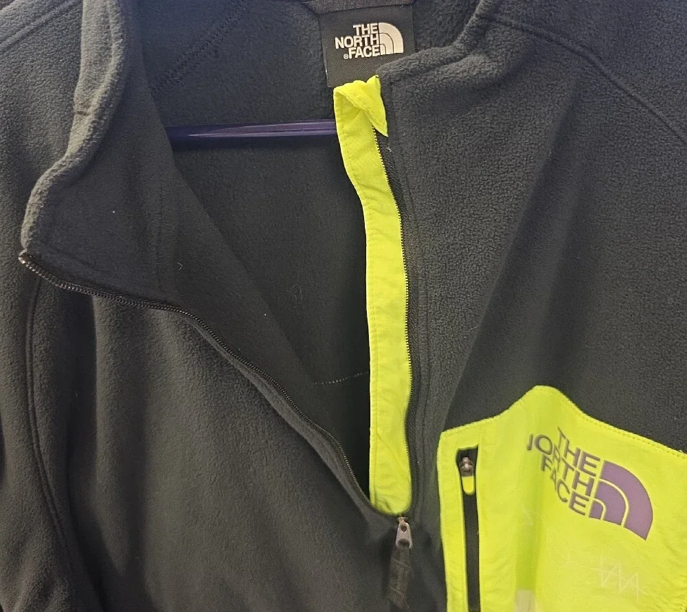 The North Face Black Fleece Jacket with Neon Yellow Zipper Tab